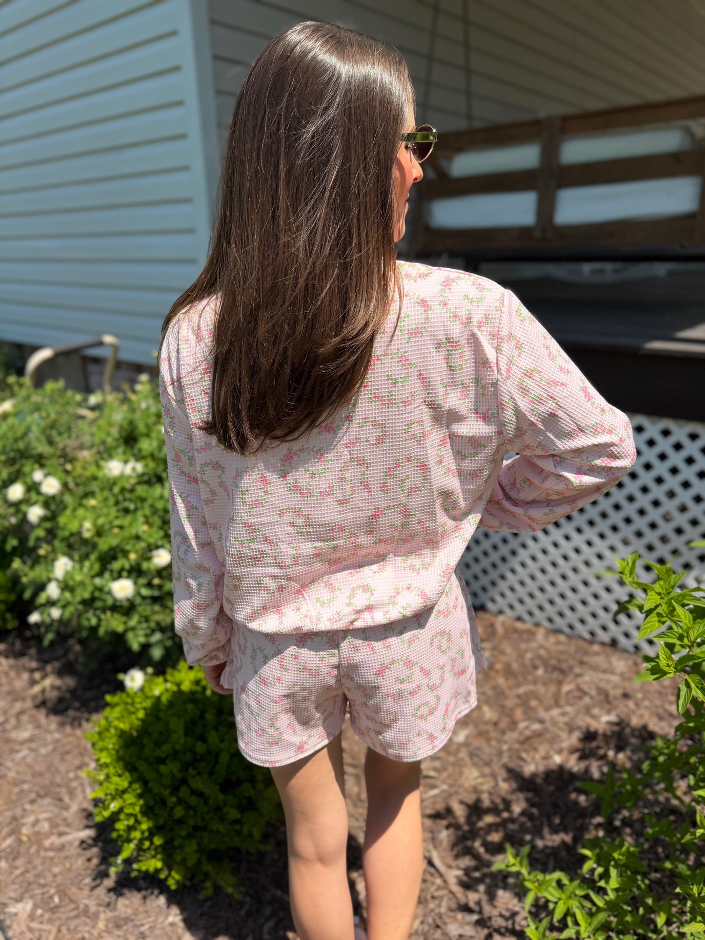 Pink floral matching skort and pullover set — a cute and comfortable outfit perfect for travel, a day out, or everyday wear