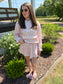 Pink floral matching skort and pullover set — a cute and comfortable outfit perfect for travel, a day out, or everyday wear