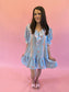 Blue and pink cotton ruffle neckline dress – a summer conversation starter.