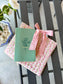 Pink quilted floral Bible cover with bow tie closure — a beautiful and practical accessory for your Bible or a thoughtful gift