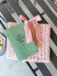 Pink quilted floral Bible cover with bow tie closure — a beautiful and practical accessory for your Bible or a thoughtful gift