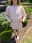 Pink floral matching skort and pullover set — a cute and comfortable outfit perfect for travel, a day out, or everyday wear