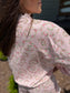 Pink floral matching skort and pullover set — a cute and comfortable outfit perfect for travel, a day out, or everyday wear