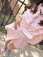 Pink floral matching skort and pullover set — a cute and comfortable outfit perfect for travel, a day out, or everyday wear