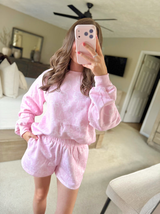 Soft and comfy pink bow sweatshirt and shorts set — perfect for dressing up for nights out or cozy stay-at-home days