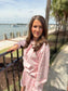 Pink floral matching skort and pullover set — a cute and comfortable outfit perfect for travel, a day out, or everyday wear