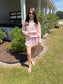 Pink floral matching skort and pullover set — a cute and comfortable outfit perfect for travel, a day out, or everyday wear