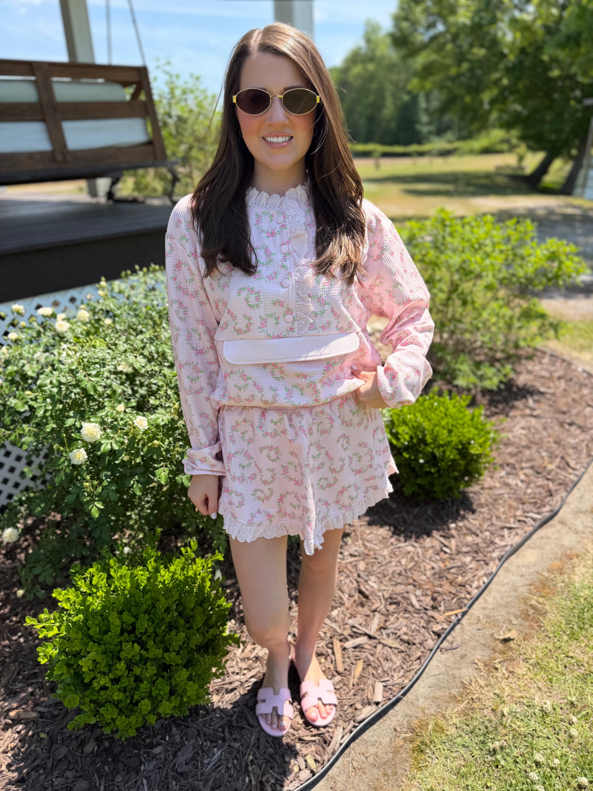Pink floral matching skort and pullover set — a cute and comfortable outfit perfect for travel, a day o
ut, or everyday wear