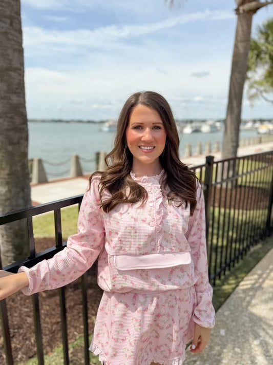 Pink floral matching skort and pullover set — a cute and comfortable outfit perfect for travel, a day out, or everyday wear